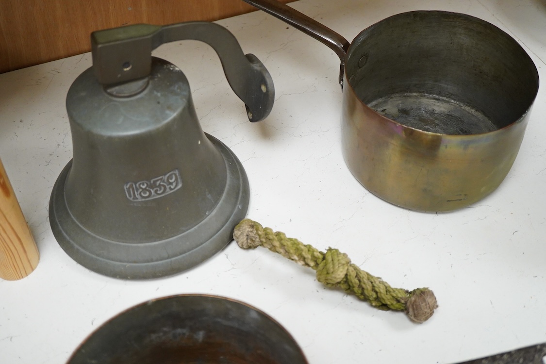 A bronze bell dated 1839 and two Victorian copper and brass saucepans